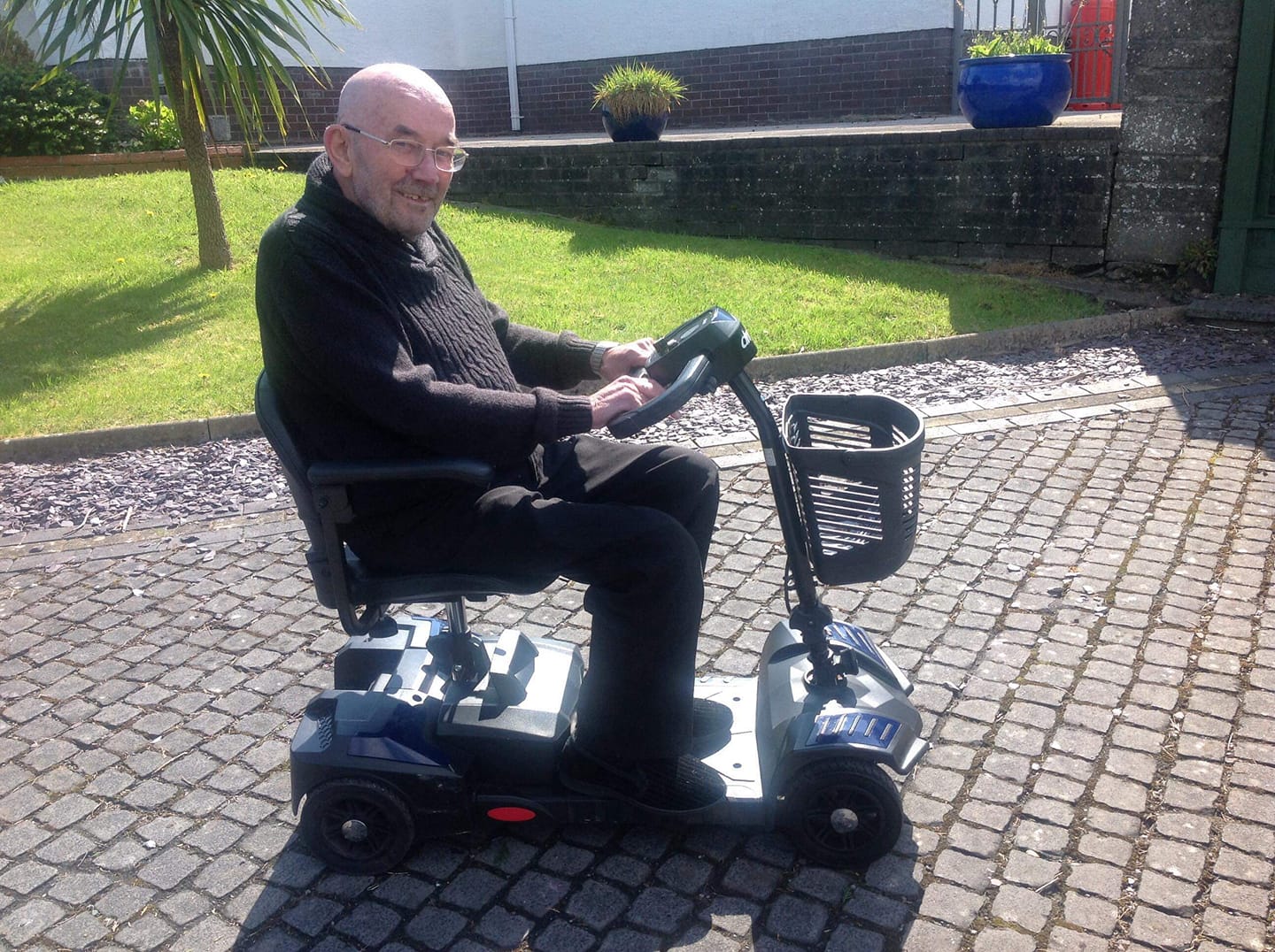 Old man on Mobility Scooter