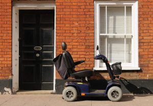 Mobility scooter infront of house